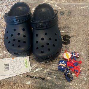 Navy blue Crocs size Kids 12 with super hero charms